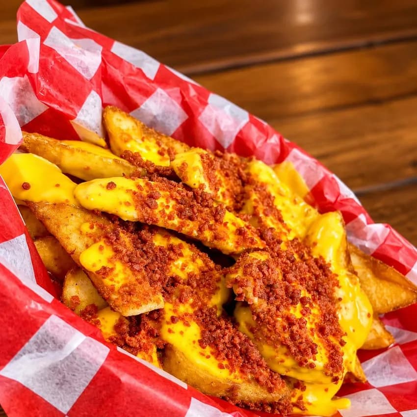 Papas Planet: papa gajo con queso cheddar y tocino deshidratado